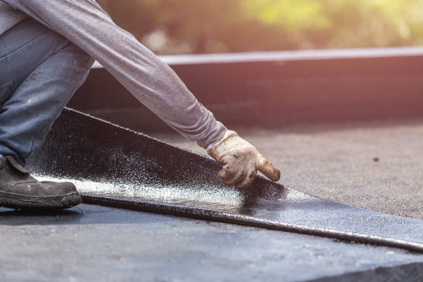 Professional Basement Waterproofing technician working in Bainbridge, OH
